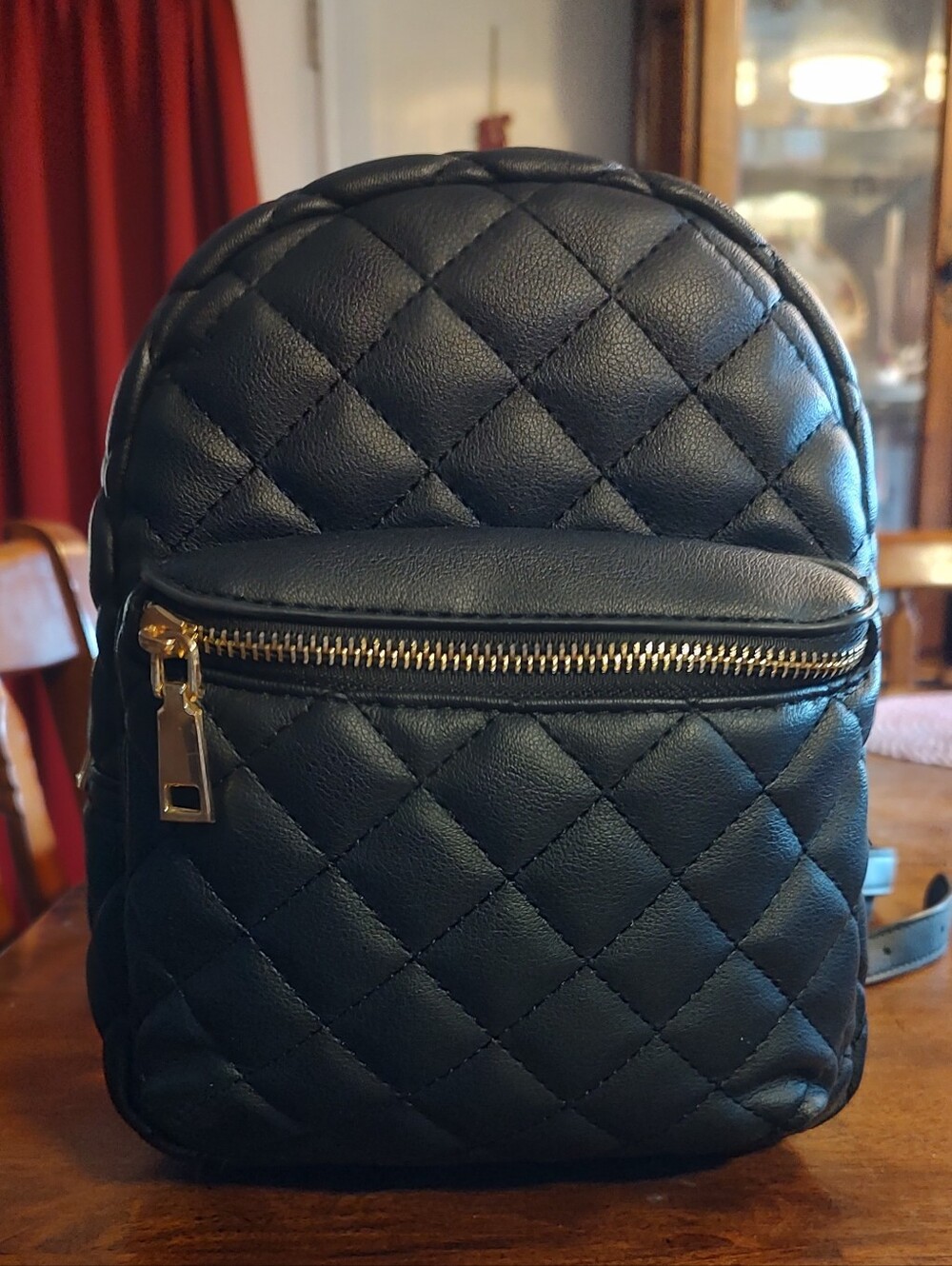 Quilted Black Mini Backpack with Gold Hardware
